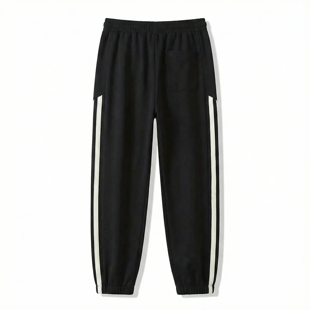 Black streetwear jogger pants with white side stripes and elastic waistband