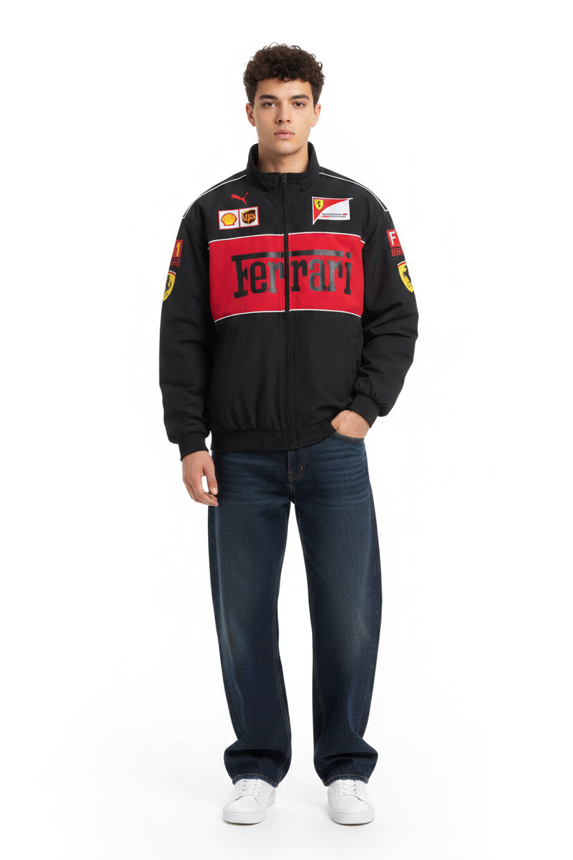 Person wearing a black Ferrari jacket with red and yellow accents on a white background