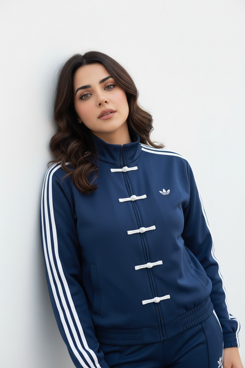 Female Model Leaning Against Wall Adidas Navy Jacket