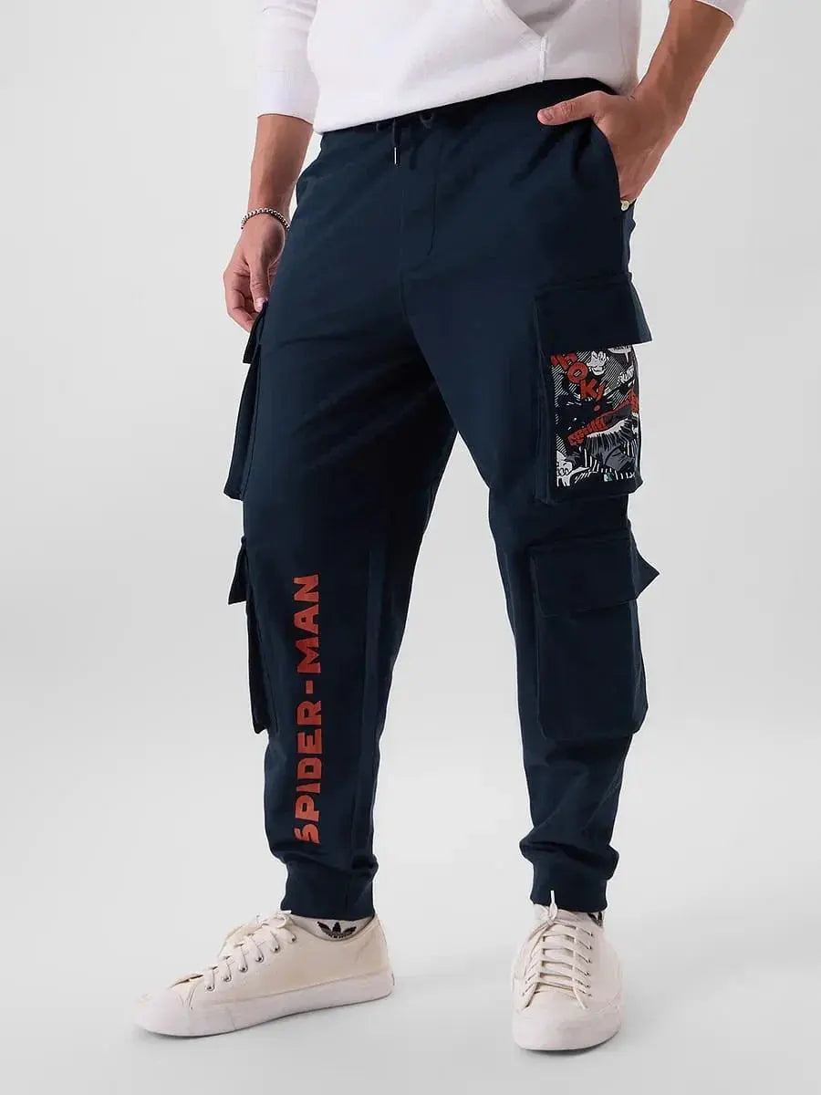 Navy Spider-Man cargo pants with comic patch, streetwear style, side pockets, and red lettering.