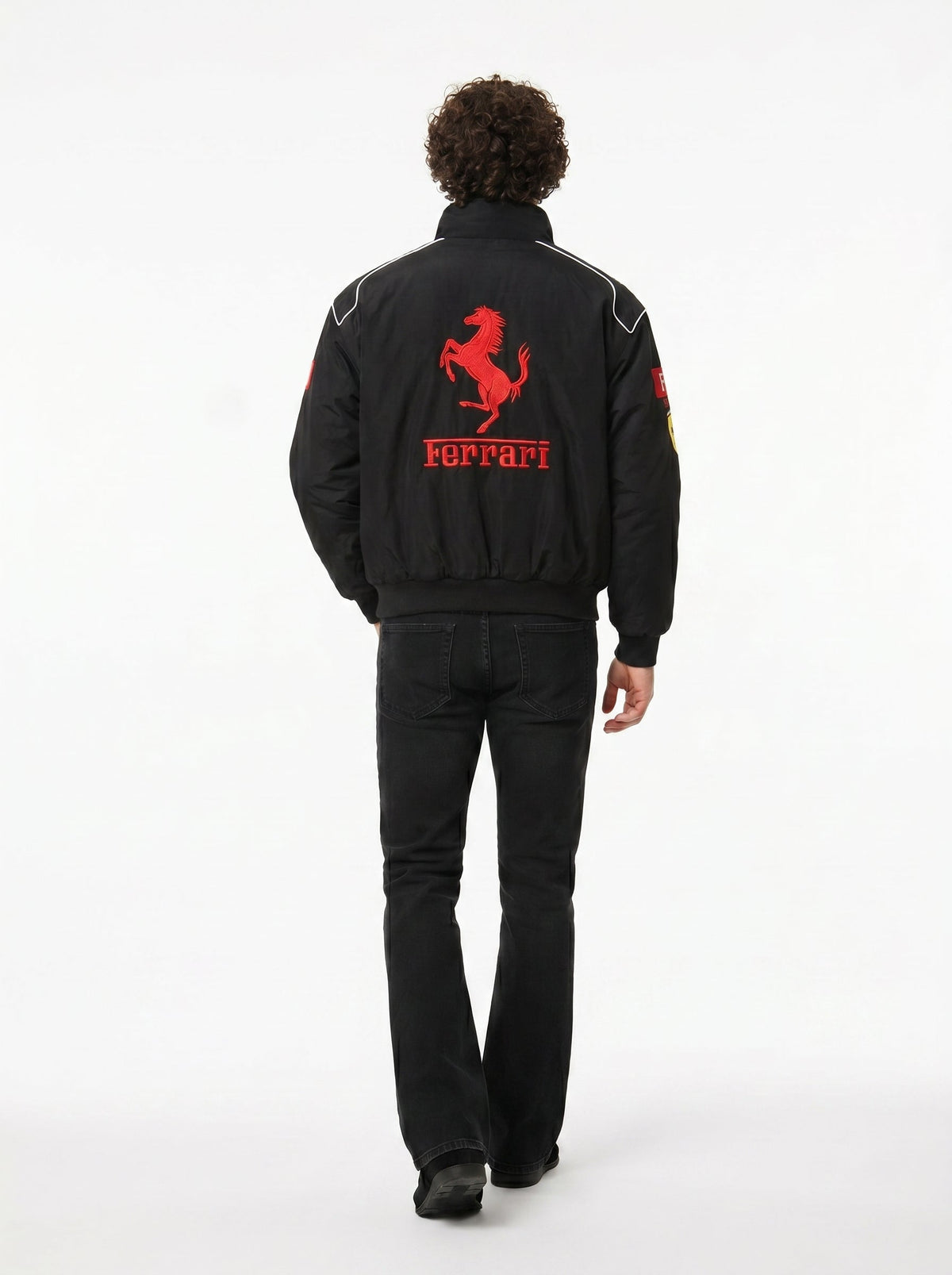 Back view of the Eclatte Ferrari Racing Jacket featuring a large red embroidered Ferrari horse logo and motorsport branding.